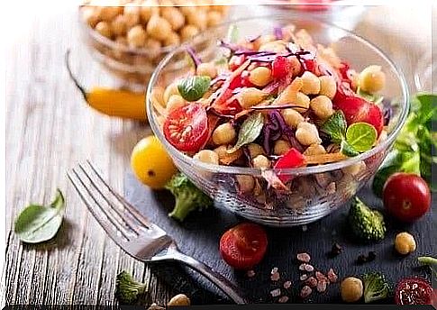 Bowl with chickpea salad and delicious eggplant