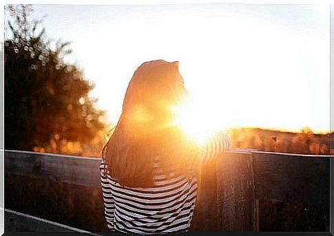 Woman watching the sunset