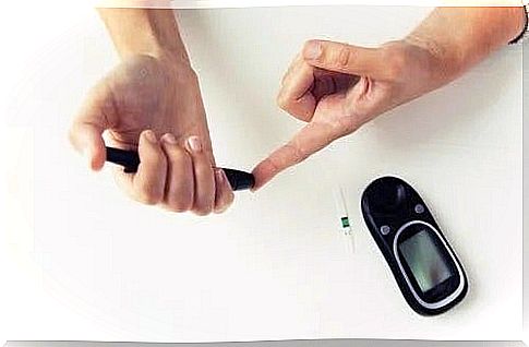 A person who measures their blood sugar