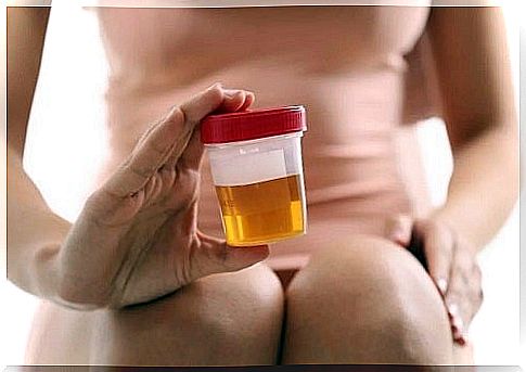 Woman holding a urine test